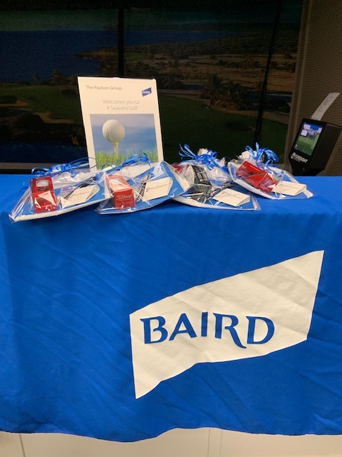 Wide shot of table with sign and gifts.jpg